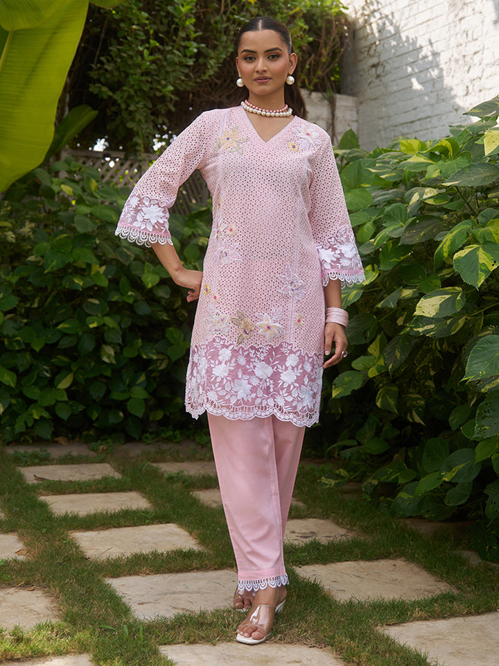 This V-neck co-ord set features delicate floral surface ornamentation for a graceful look. Shop Now!