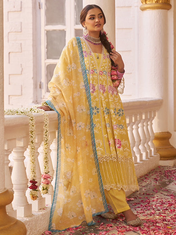 This elegant cotton Anarkali kurta set showcases delicate floral embroidery. Shop Now!