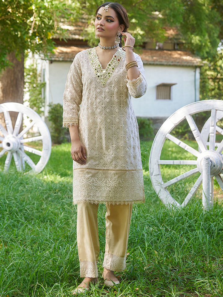 This co-ord set features intricate schiffli embroidery that adds depth and texture. Shop Now!