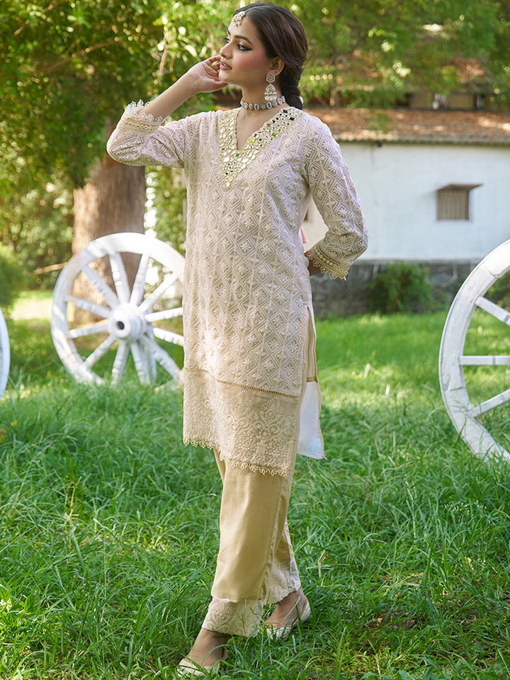 This co-ord set features intricate schiffli embroidery that adds depth and texture. Shop Now!