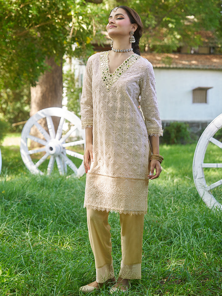 This co-ord set features intricate schiffli embroidery that adds depth and texture. Shop Now!
