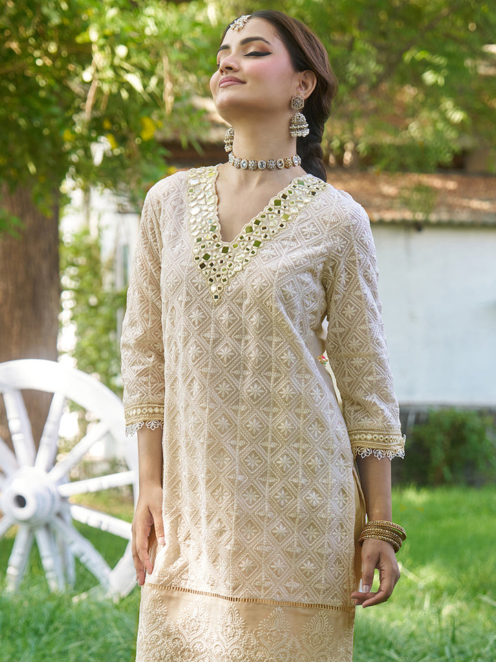 This co-ord set features intricate schiffli embroidery that adds depth and texture. Shop Now!