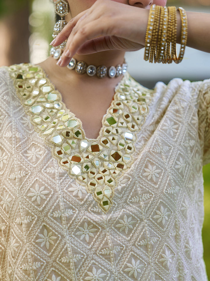 This co-ord set features intricate schiffli embroidery that adds depth and texture. Shop Now!