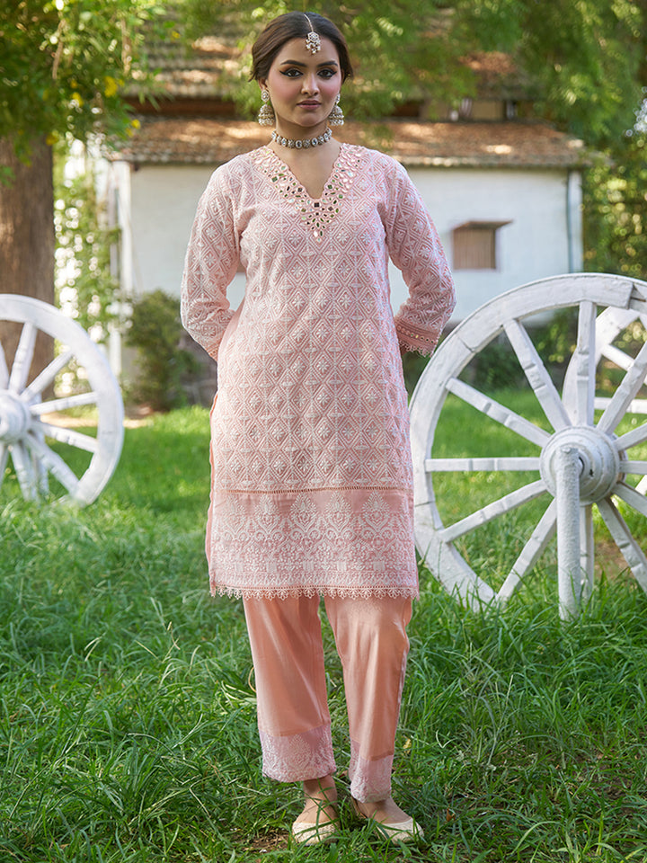 Designed in shimmer georgette, this co-ord set features intricate schiffli embroidery. Shop Now!