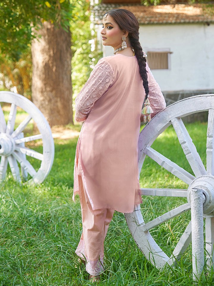 Designed in shimmer georgette, this co-ord set features intricate schiffli embroidery. Shop Now!