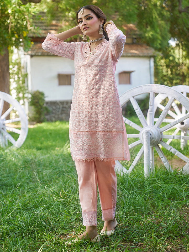 Designed in shimmer georgette, this co-ord set features intricate schiffli embroidery. Shop Now!