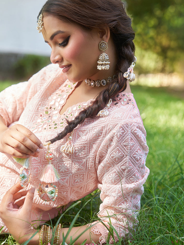 Designed in shimmer georgette, this co-ord set features intricate schiffli embroidery. Shop Now!
