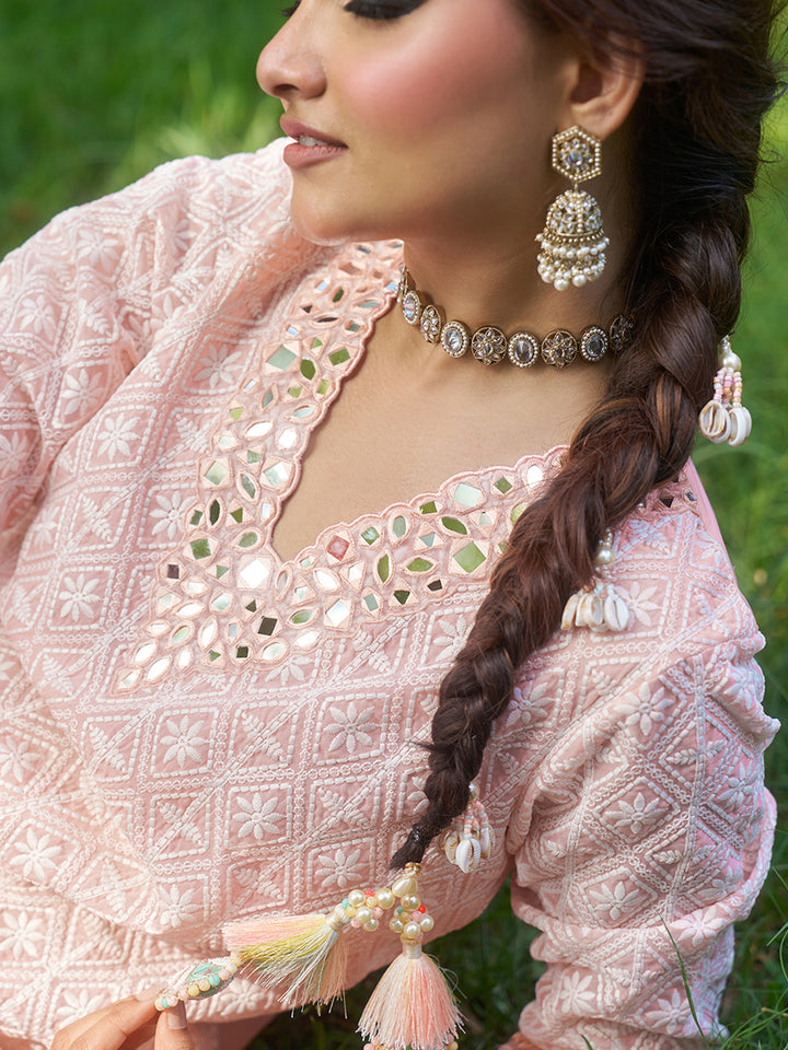 Designed in shimmer georgette, this co-ord set features intricate schiffli embroidery. Shop Now!