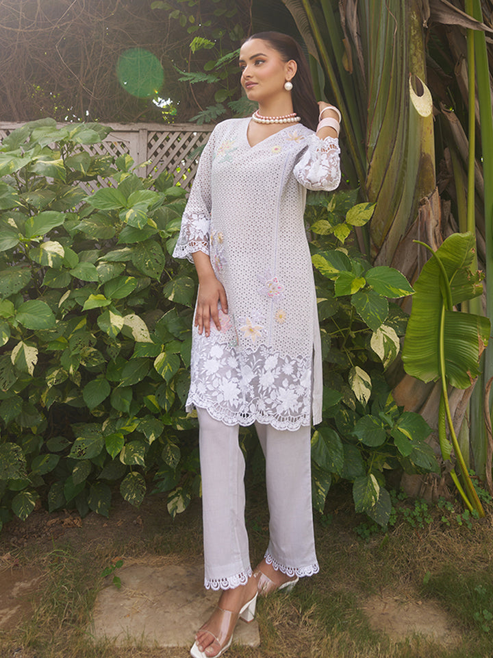 This V-neck co-ord set features delicate floral surface ornamentation for a graceful look. Shop Now!