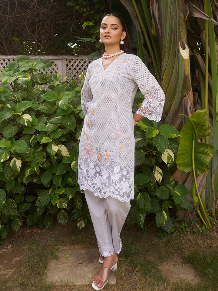 This V-neck co-ord set features delicate floral surface ornamentation for a graceful look. Shop Now!