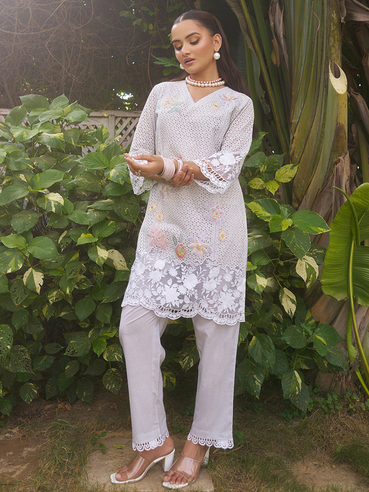 This V-neck co-ord set features delicate floral surface ornamentation for a graceful look. Shop Now!
