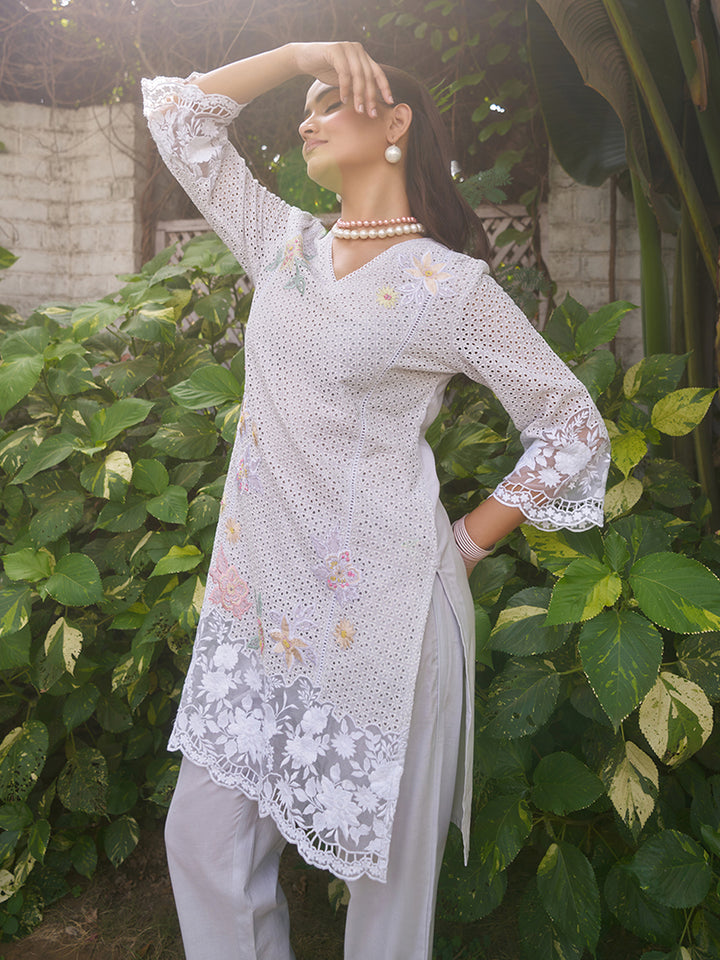 This V-neck co-ord set features delicate floral surface ornamentation for a graceful look. Shop Now!