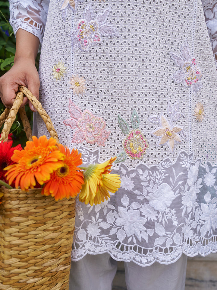 This V-neck co-ord set features delicate floral surface ornamentation for a graceful look. Shop Now!