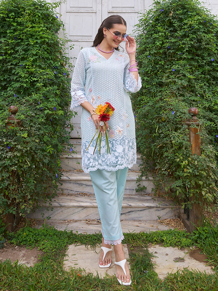 This V-neck co-ord set features delicate floral surface ornamentation for a graceful look. Shop Now!