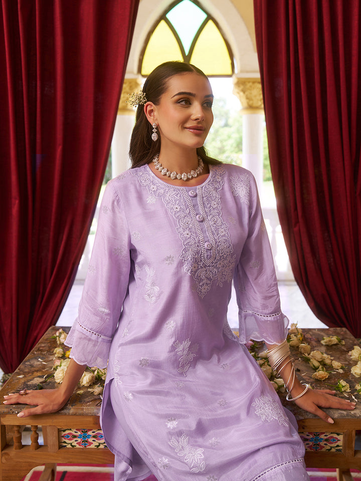 Crafted in luxurious viscose fabric, this co-ord set features a classic round neckline. Shop Now!