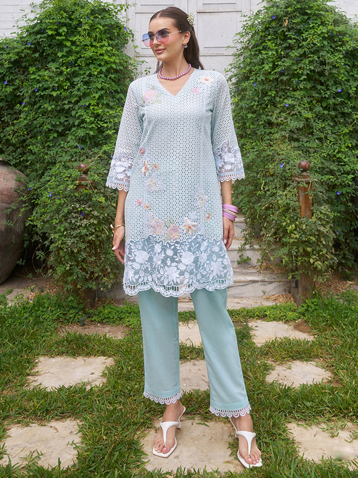 This V-neck co-ord set features delicate floral surface ornamentation for a graceful look. Shop Now!