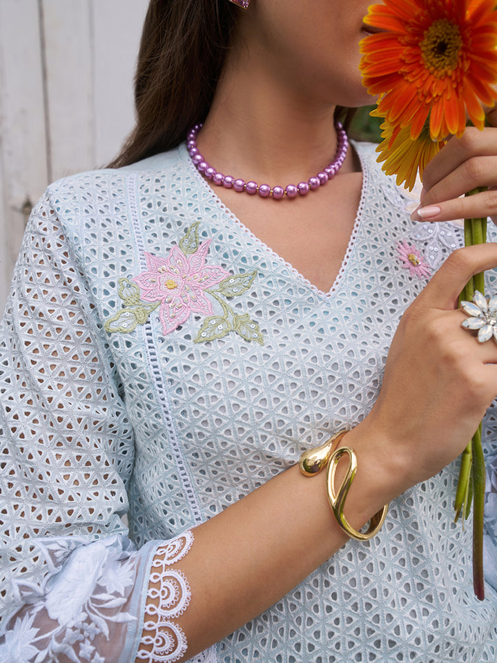 This V-neck co-ord set features delicate floral surface ornamentation for a graceful look. Shop Now!