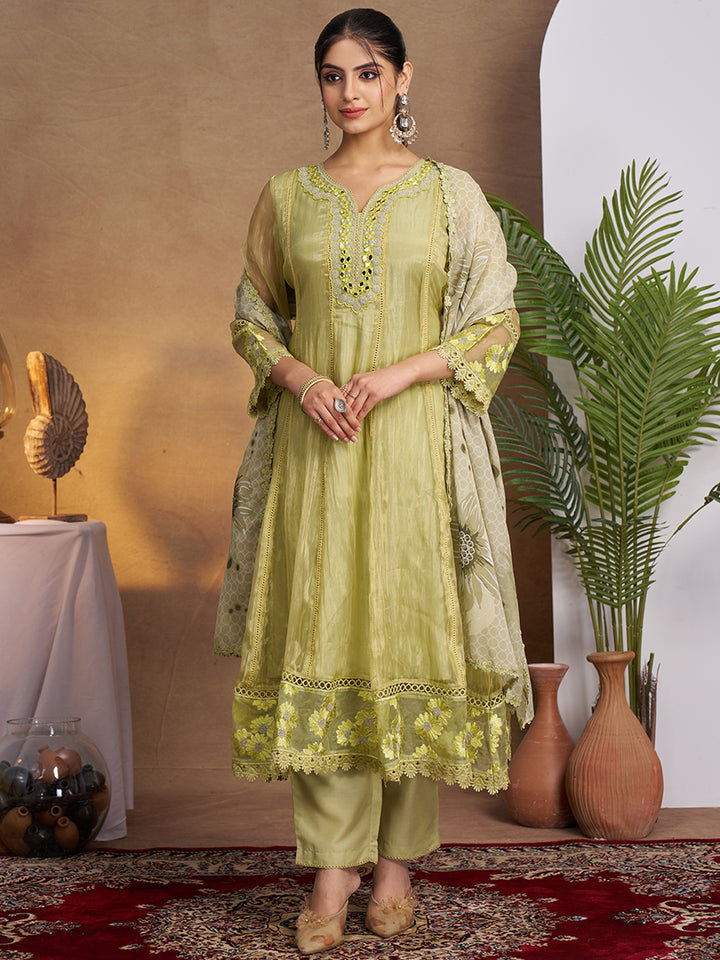 This Kurta Set features intricate embroidery on a lightweight, glossy organza fabric. Shop Now!