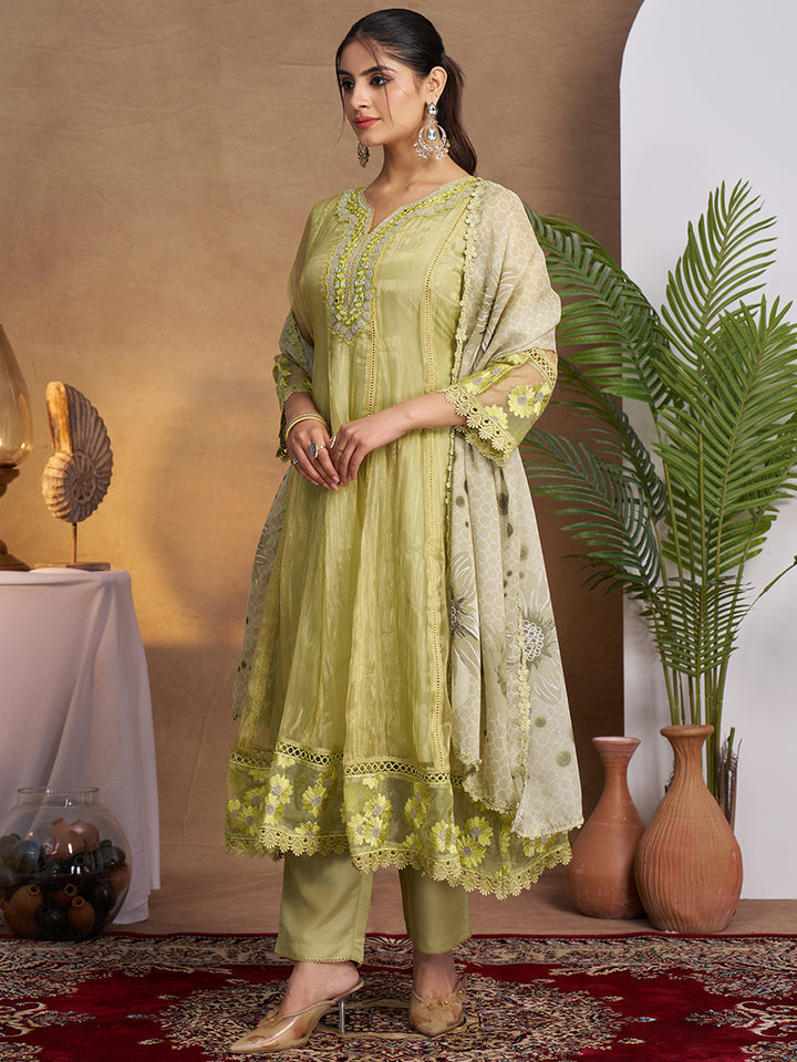 This Kurta Set features intricate embroidery on a lightweight, glossy organza fabric. Shop Now!