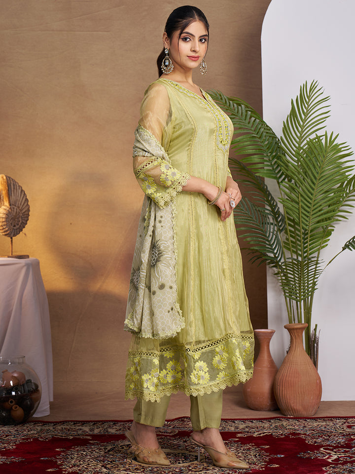 This Kurta Set features intricate embroidery on a lightweight, glossy organza fabric. Shop Now!