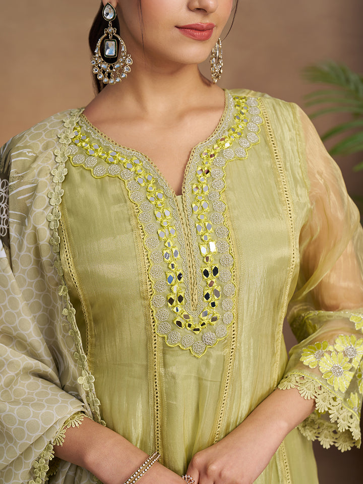 This Kurta Set features intricate embroidery on a lightweight, glossy organza fabric. Shop Now!