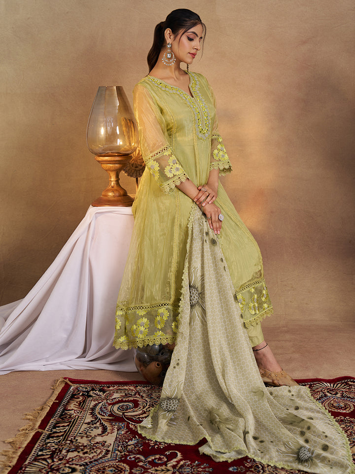 This Kurta Set features intricate embroidery on a lightweight, glossy organza fabric. Shop Now!