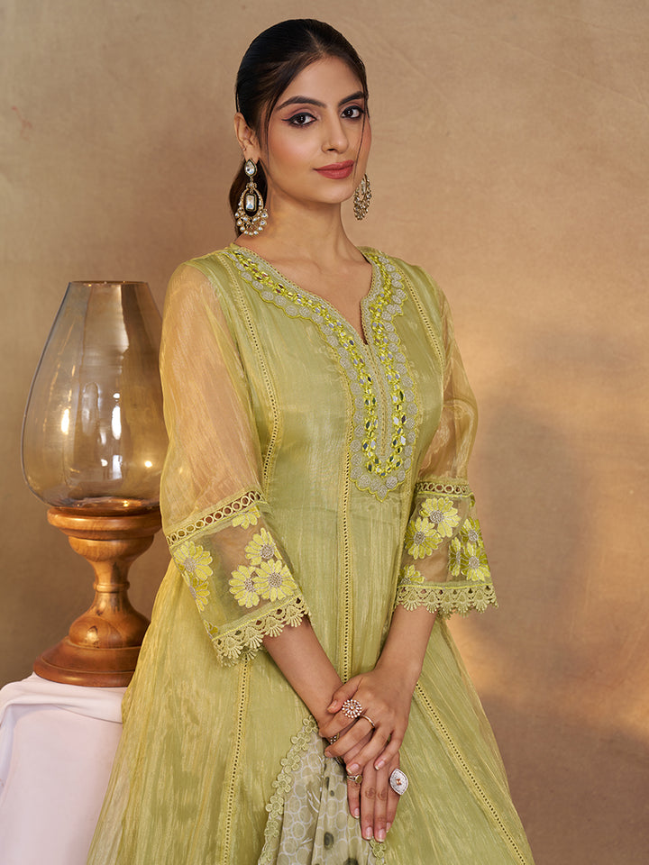 This Kurta Set features intricate embroidery on a lightweight, glossy organza fabric. Shop Now!